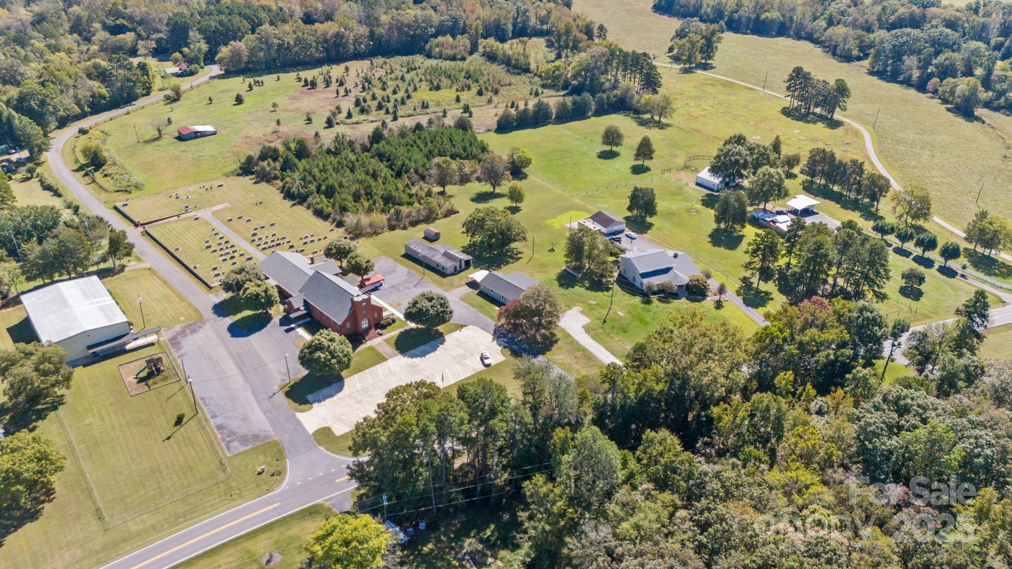 1362 Cornatzer Road Mocksville, NC 27028 - Photo 40 of 48 an aerial view of a house with a yard