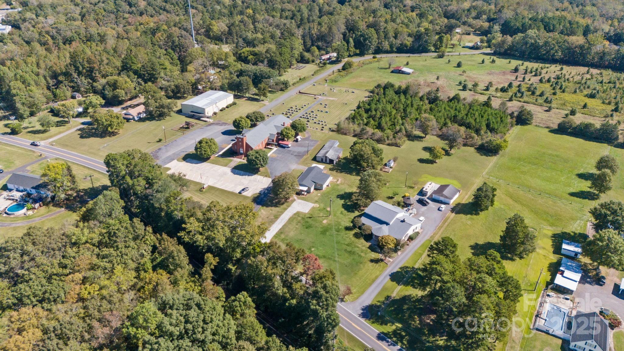 1362 Cornatzer Road Mocksville, NC 27028 - Photo 41 of 48 an aerial view of a house with a yard