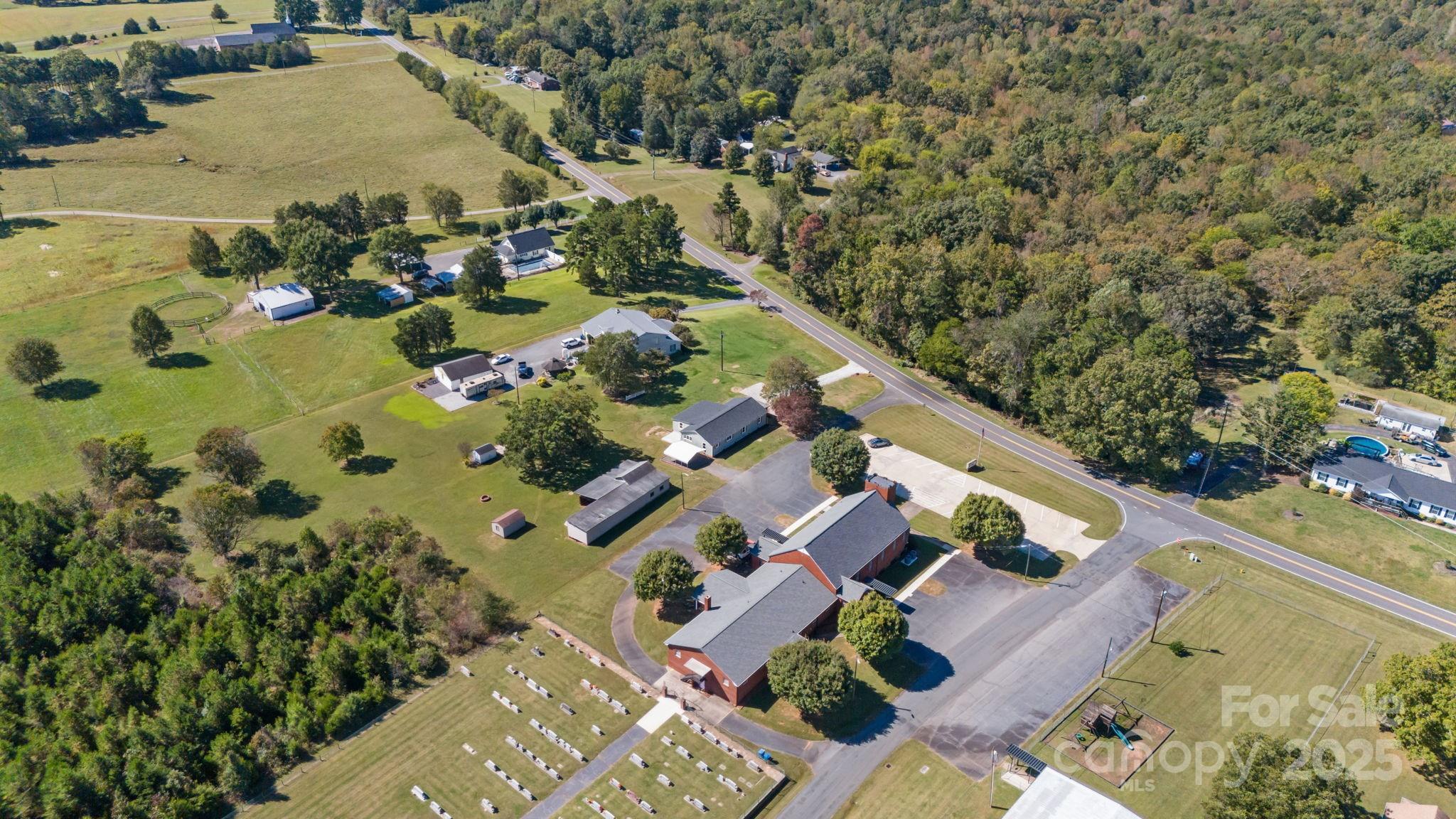 1362 Cornatzer Road Mocksville, NC 27028 - Photo 43 of 48 an aerial view of residential house with outdoor space