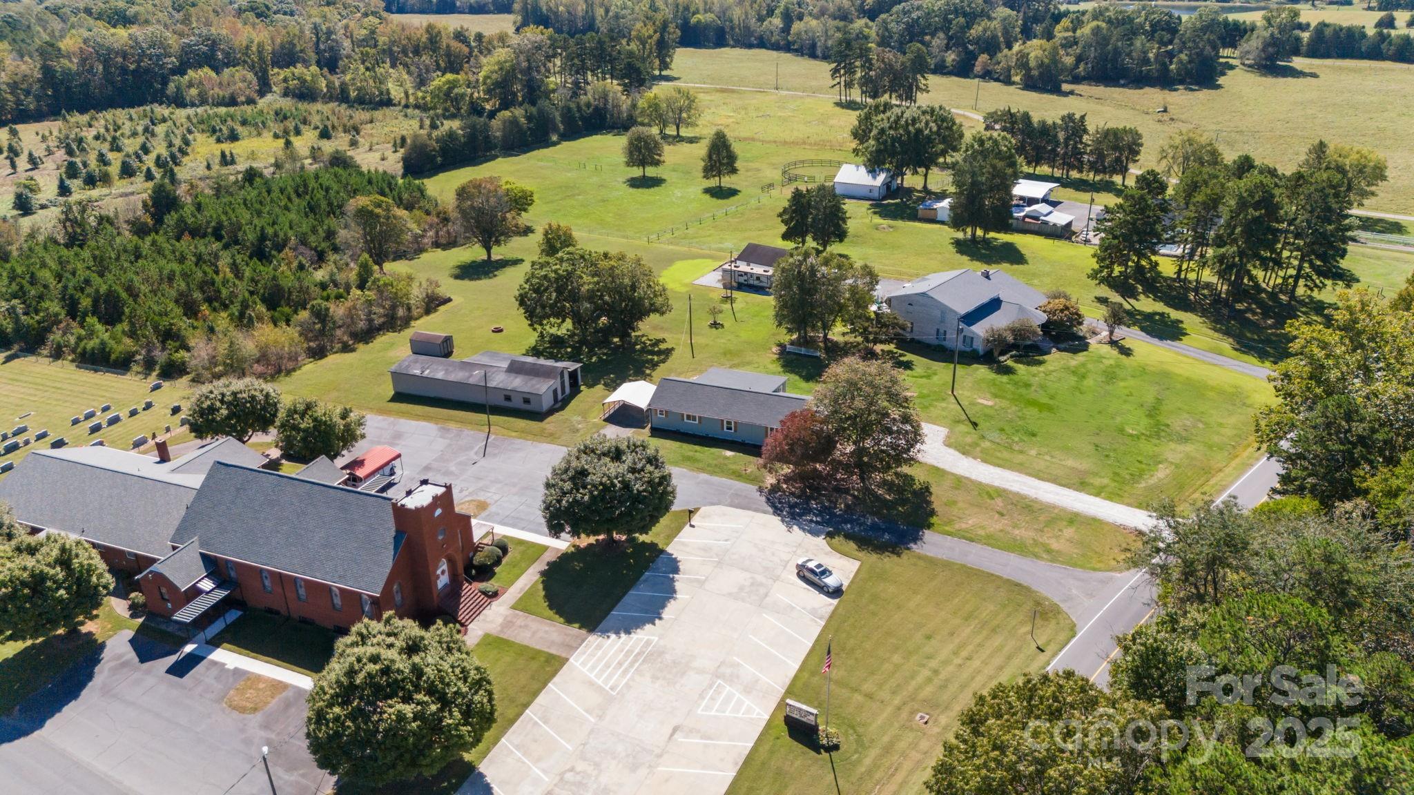 1362 Cornatzer Road Mocksville, NC 27028 - Photo 45 of 48 an aerial view of a house with a garden