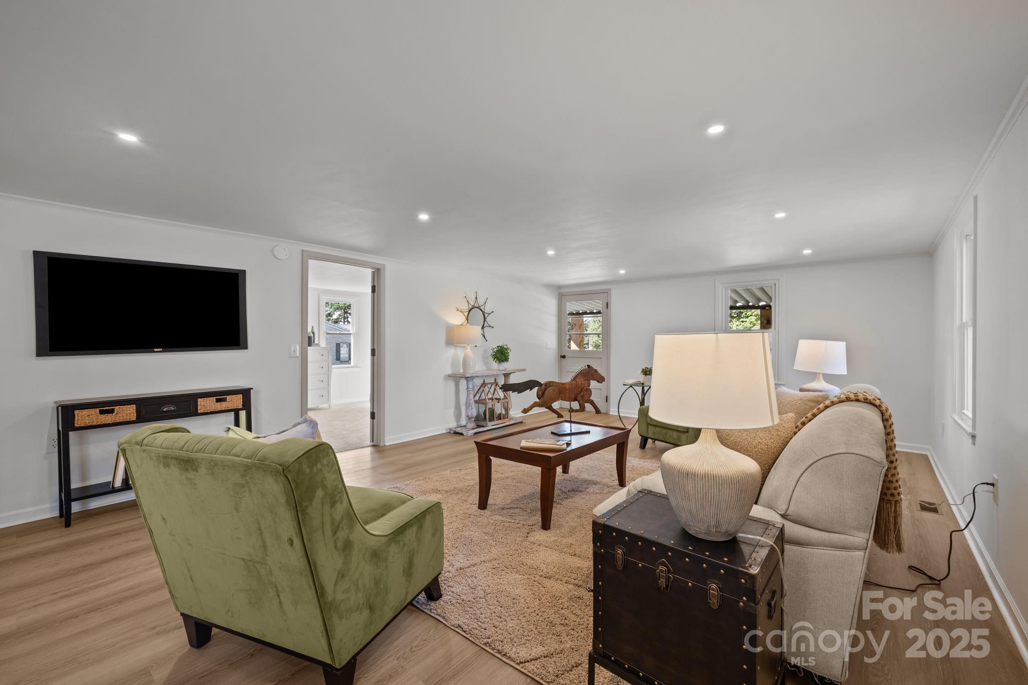 1362 Cornatzer Road Mocksville, NC 27028 - Photo 9 of 48 a living room with furniture and a flat screen tv