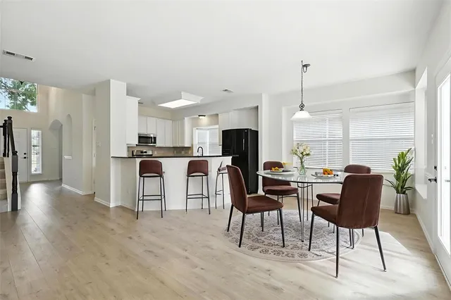 a view of a dining room with furniture