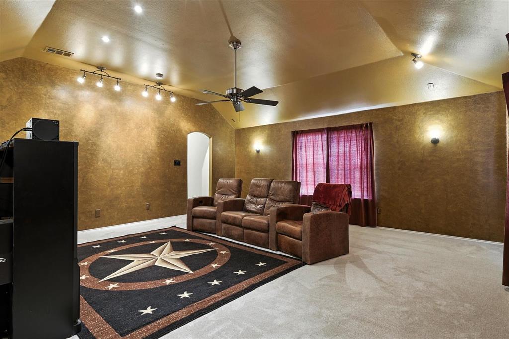 5713 Green Hollow Lane The Colony, TX 75056 - Photo 26 of 29 a living room with couch