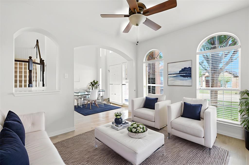 5713 Green Hollow Lane The Colony, TX 75056 - Photo 8 of 29 a living room with furniture and wooden floor