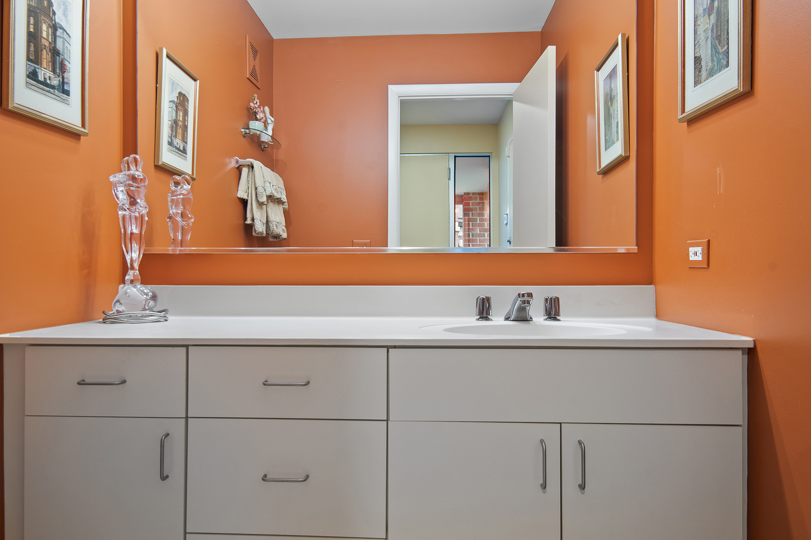 507 Kelburn Road Deerfield, IL 60015 - Photo 11 of 26 a bathroom with a sink and a mirror