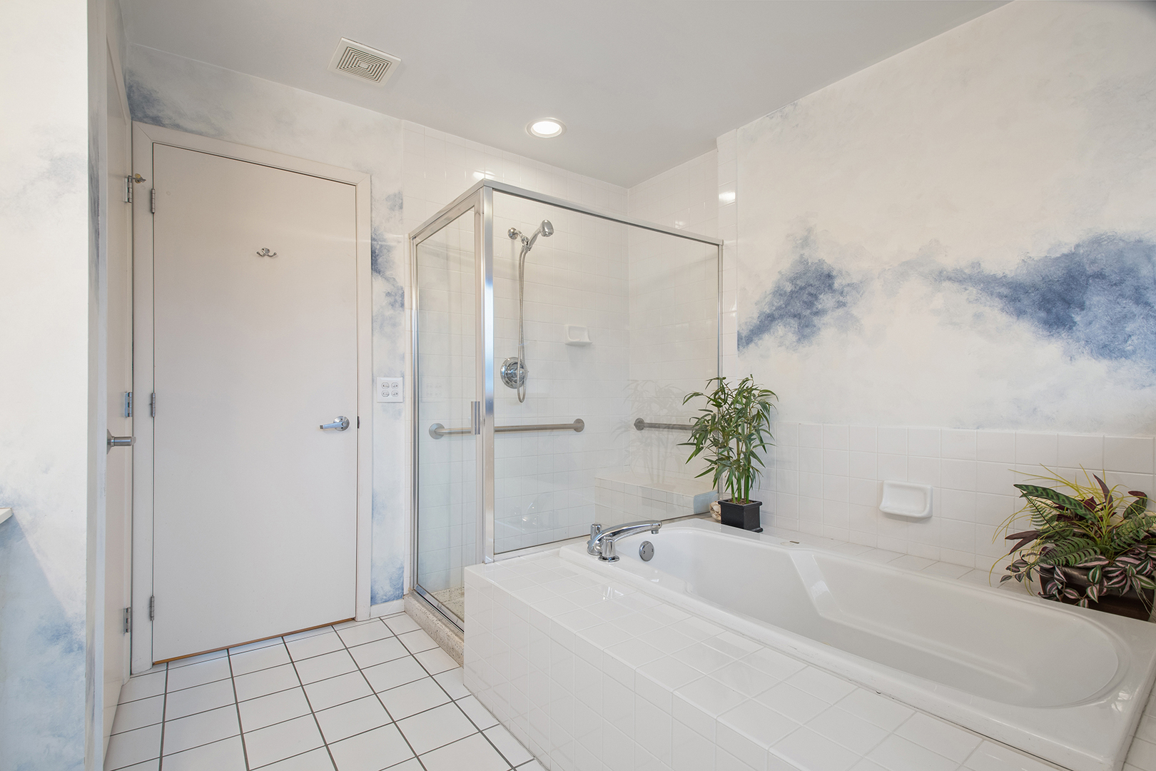 507 Kelburn Road Deerfield, IL 60015 - Photo 14 of 26 a bathroom with a bathtub and a shower