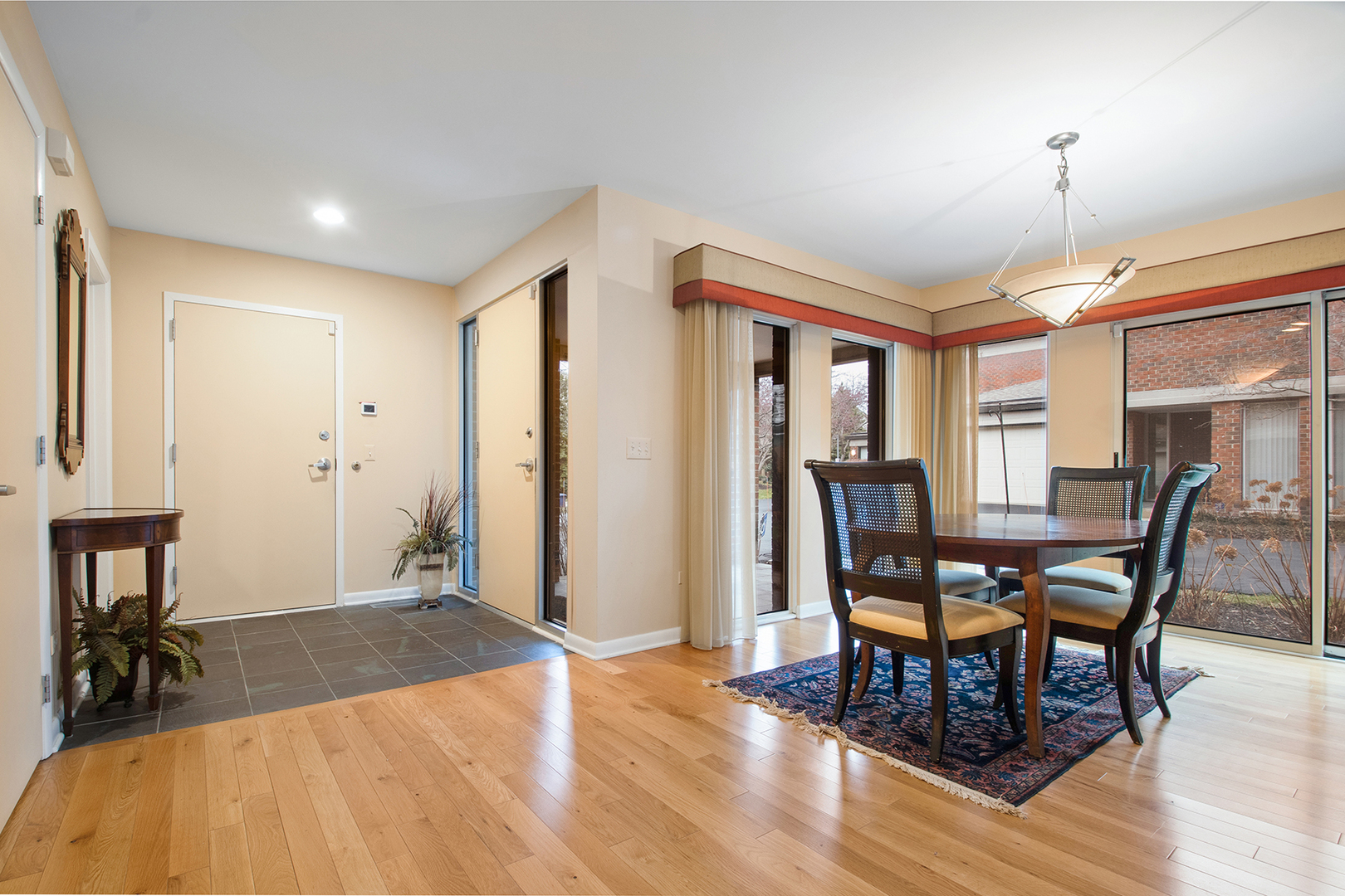 507 Kelburn Road Deerfield, IL 60015 - Photo 2 of 26 a view of a dining room with furniture and window