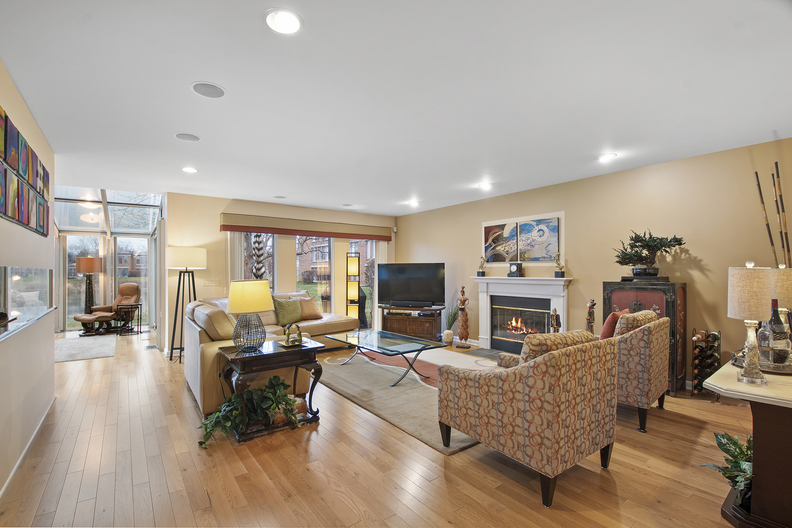 507 Kelburn Road Deerfield, IL 60015 - Photo 9 of 26 a living room with fireplace furniture and a flat screen tv