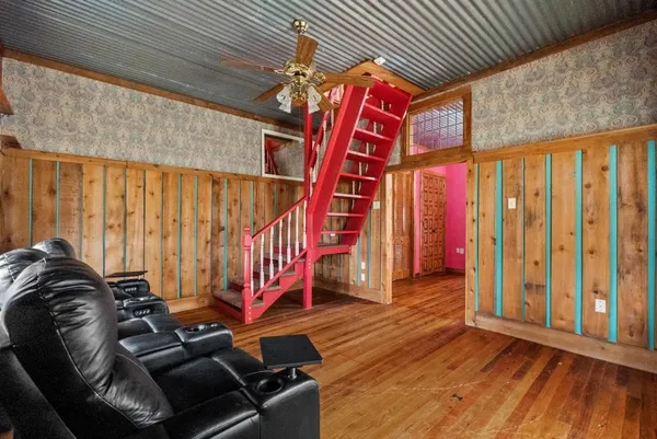 a view of entryway with wooden floor