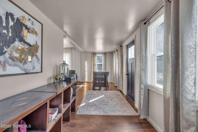 a living room with furniture and a table