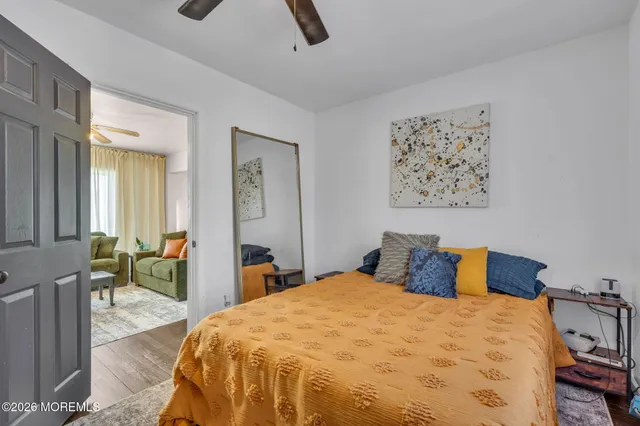 a bed room with a bed and a window