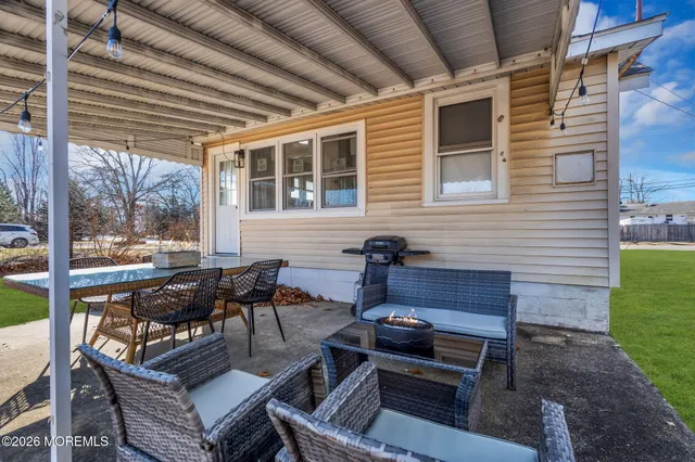 a view of an house with backyard space and garden