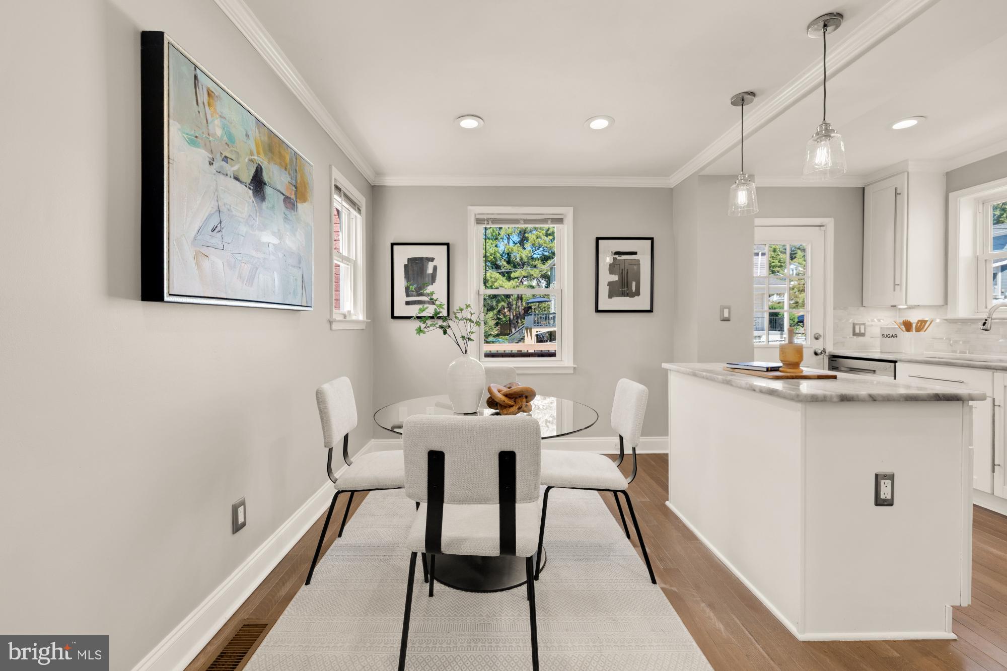 2414 Perry Street Northeast Washington, DC 20018 - Photo 12 of 49 a view of a dining room with furniture and wooden floor