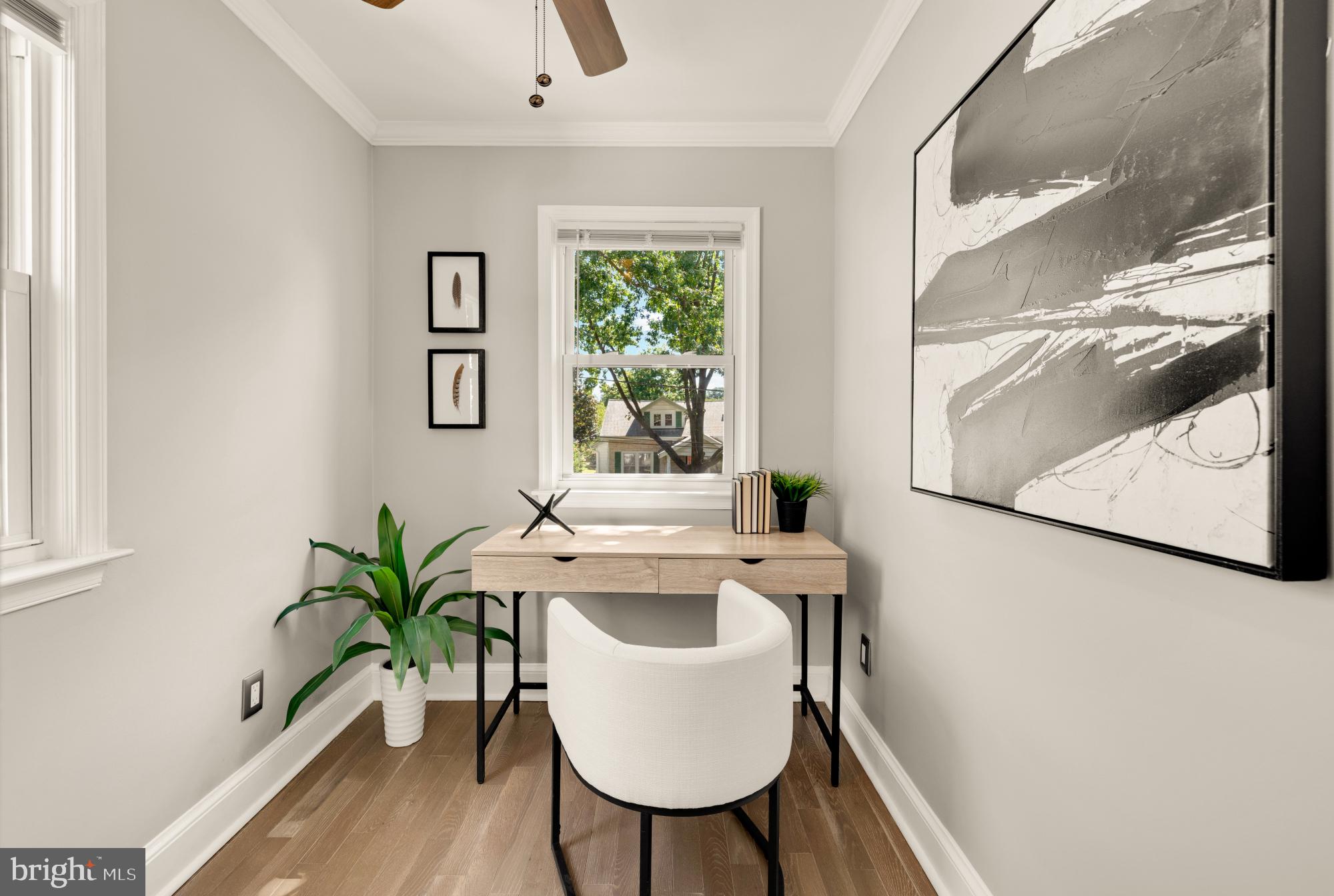 2414 Perry Street Northeast Washington, DC 20018 - Photo 29 of 49 a view of a dining room with furniture window and wooden floor