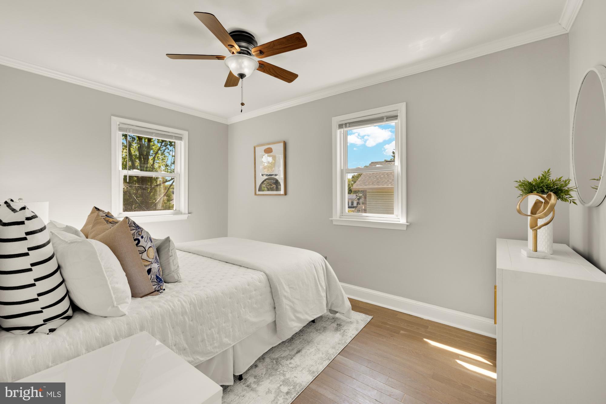 2414 Perry Street Northeast Washington, DC 20018 - Photo 31 of 49 a bedroom with a bed and a window