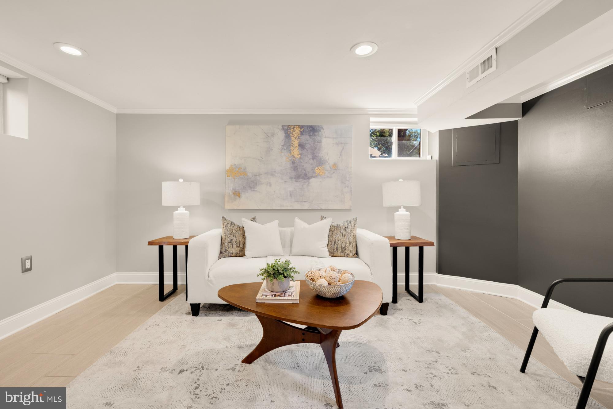 2414 Perry Street Northeast Washington, DC 20018 - Photo 36 of 49 a living room with furniture and a table