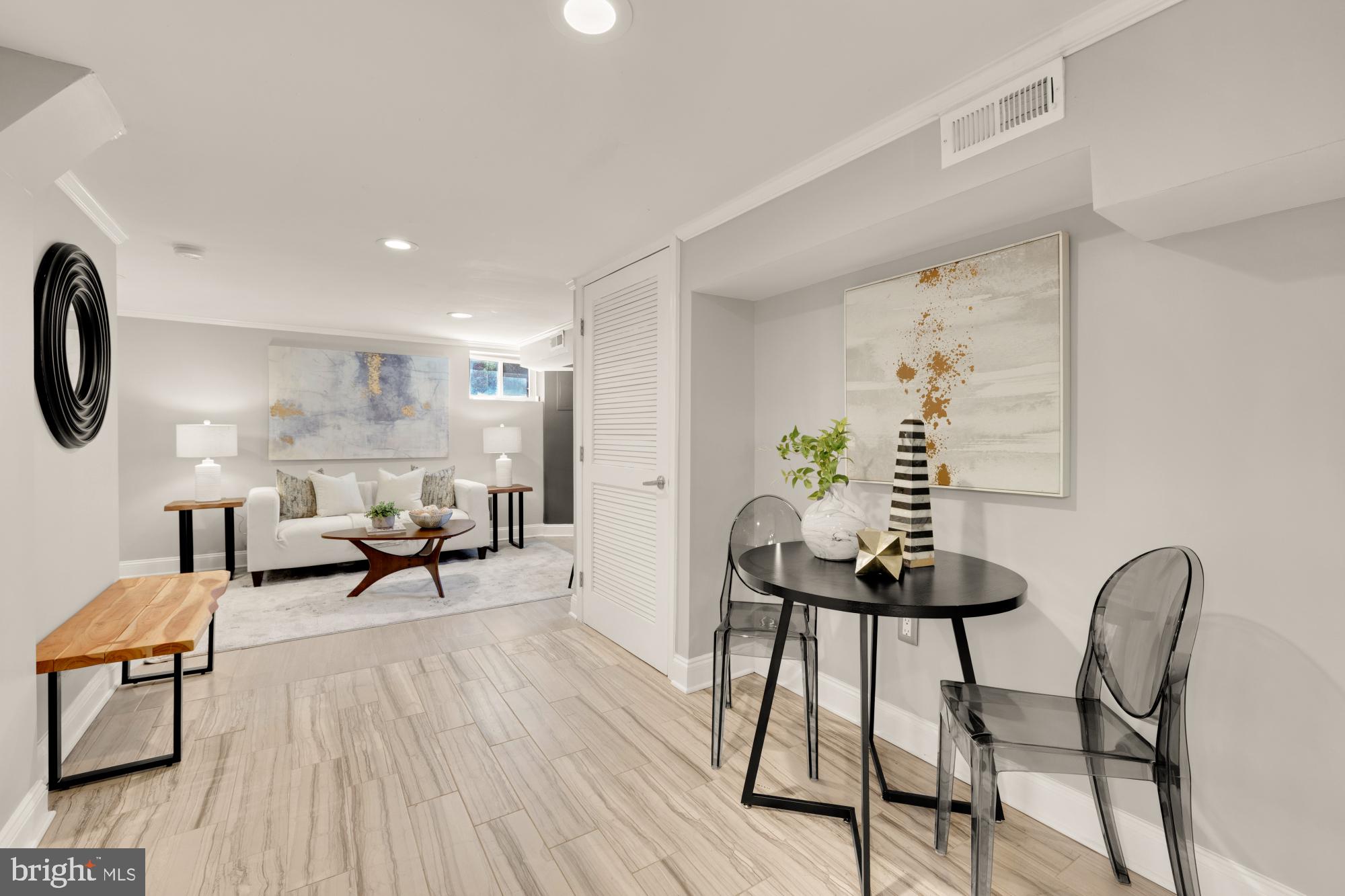 2414 Perry Street Northeast Washington, DC 20018 - Photo 39 of 49 a living room with furniture and a table