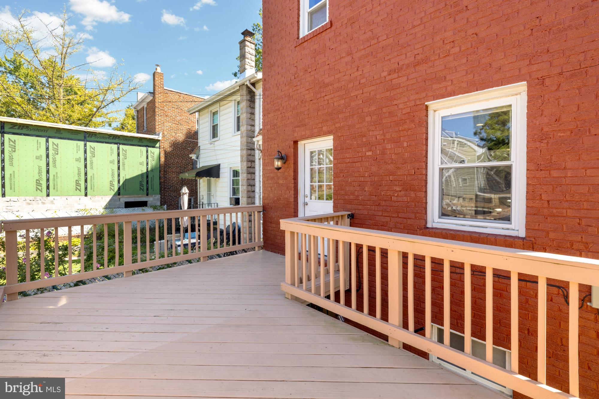 2414 Perry Street Northeast Washington, DC 20018 - Photo 45 of 49 a porch with a wooden fence