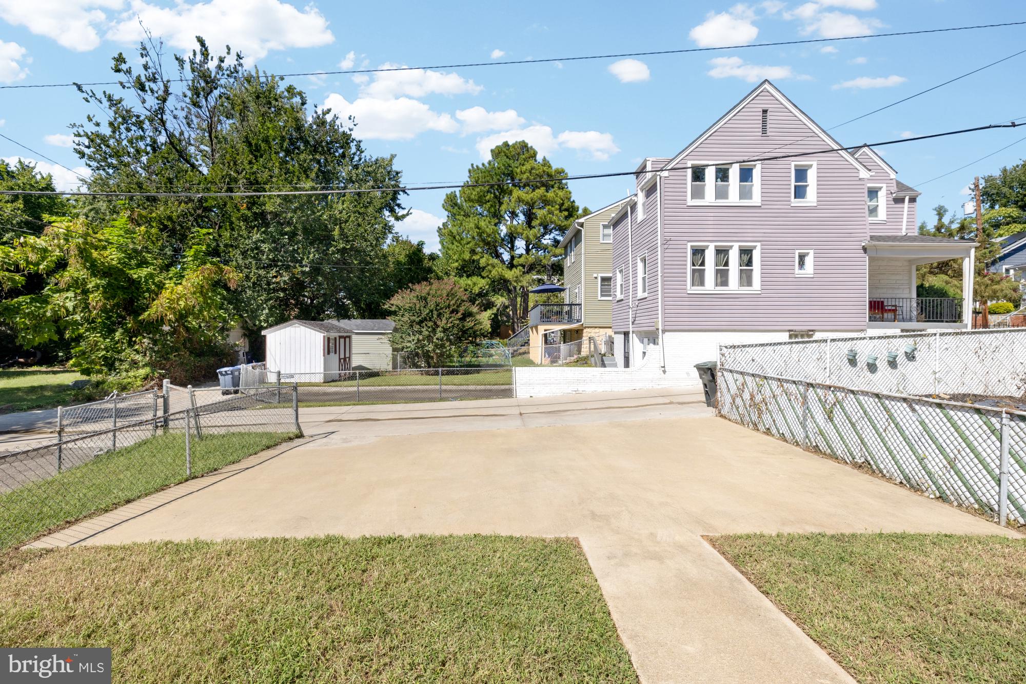 2414 Perry Street Northeast Washington, DC 20018 - Photo 48 of 49 a view of a house with a yard