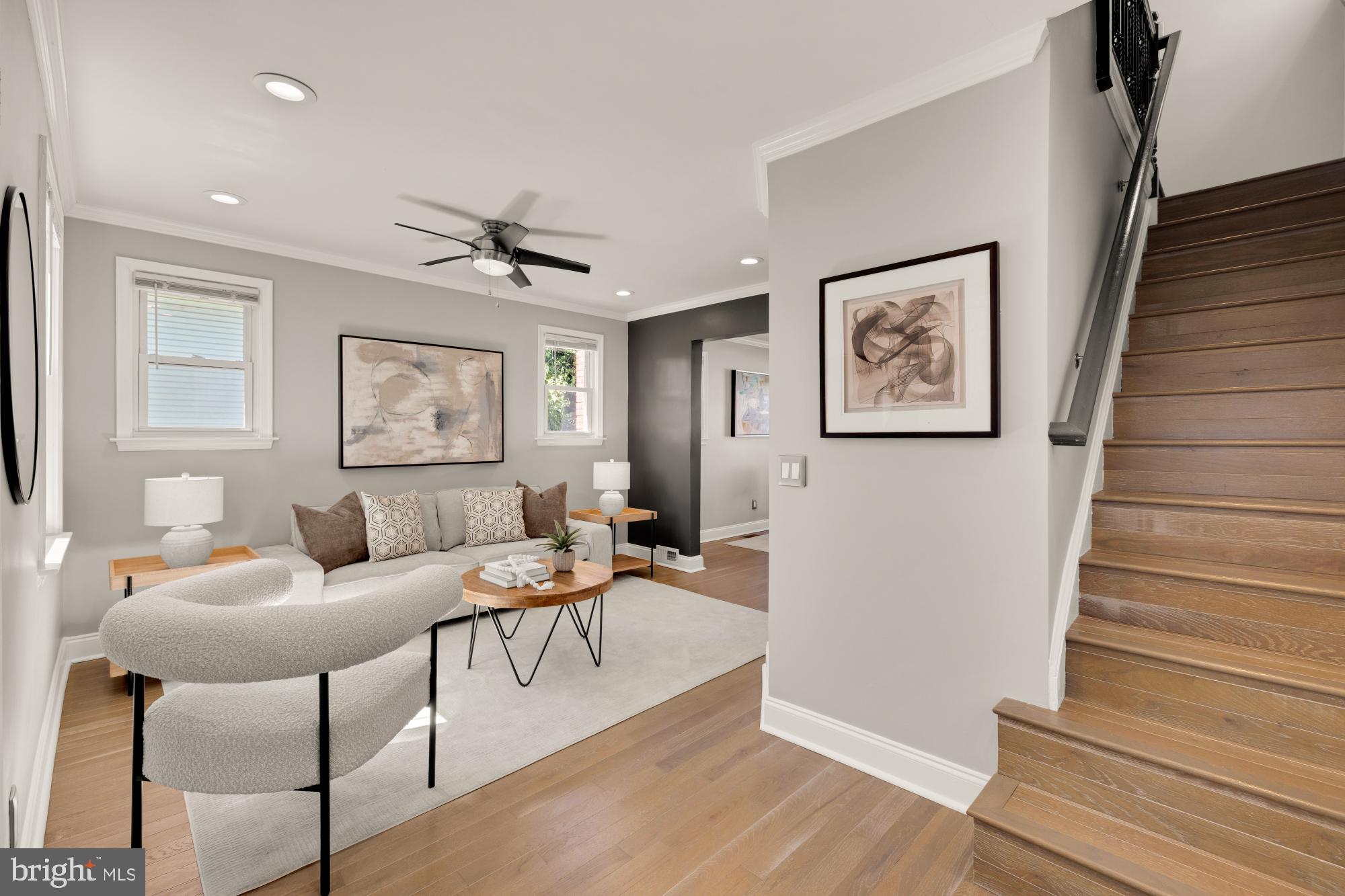 2414 Perry Street Northeast Washington, DC 20018 - Photo 5 of 49 a living room with furniture and wooden floor