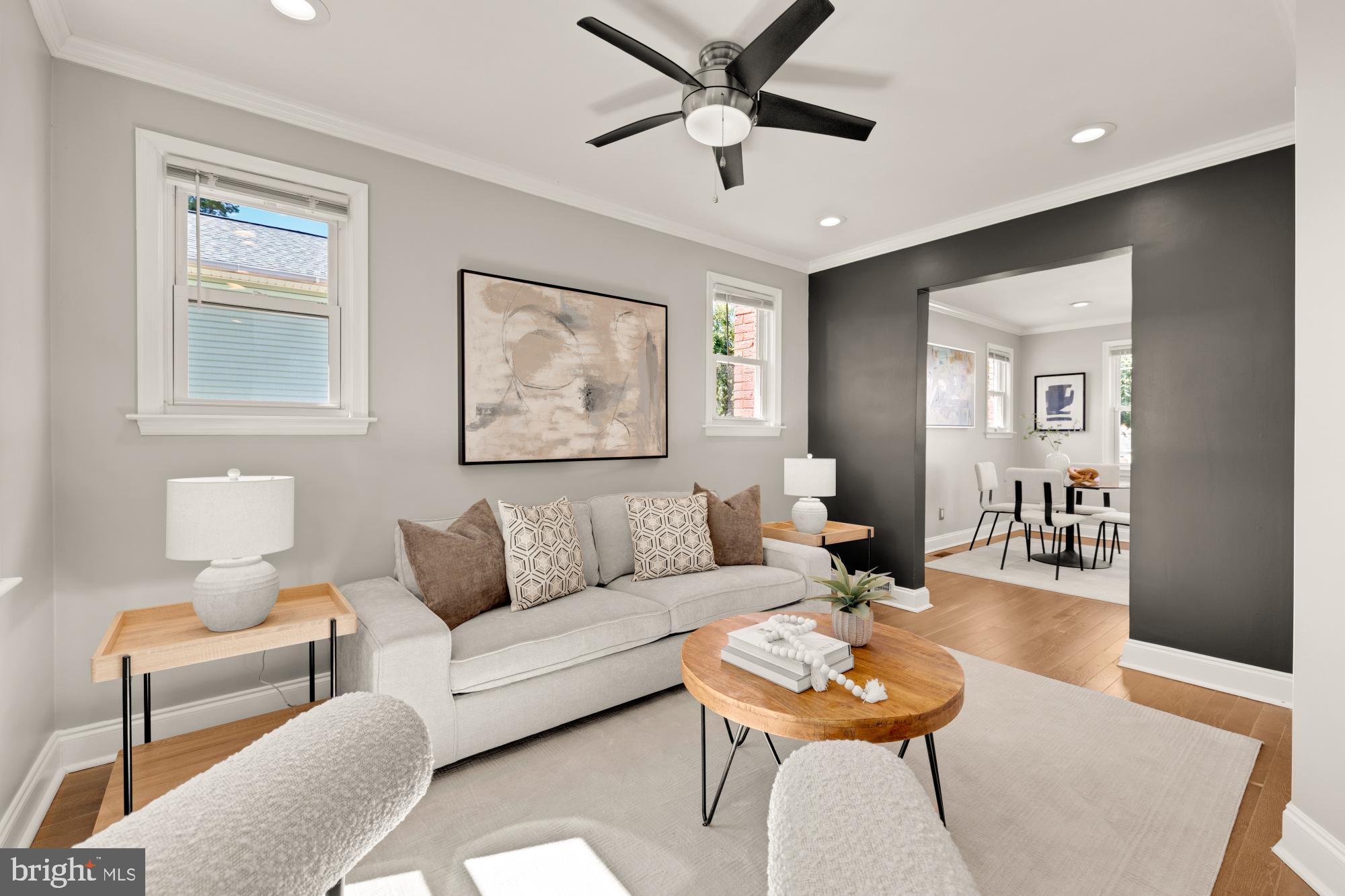 2414 Perry Street Northeast Washington, DC 20018 - Photo 6 of 49 a living room with furniture and a wooden floor