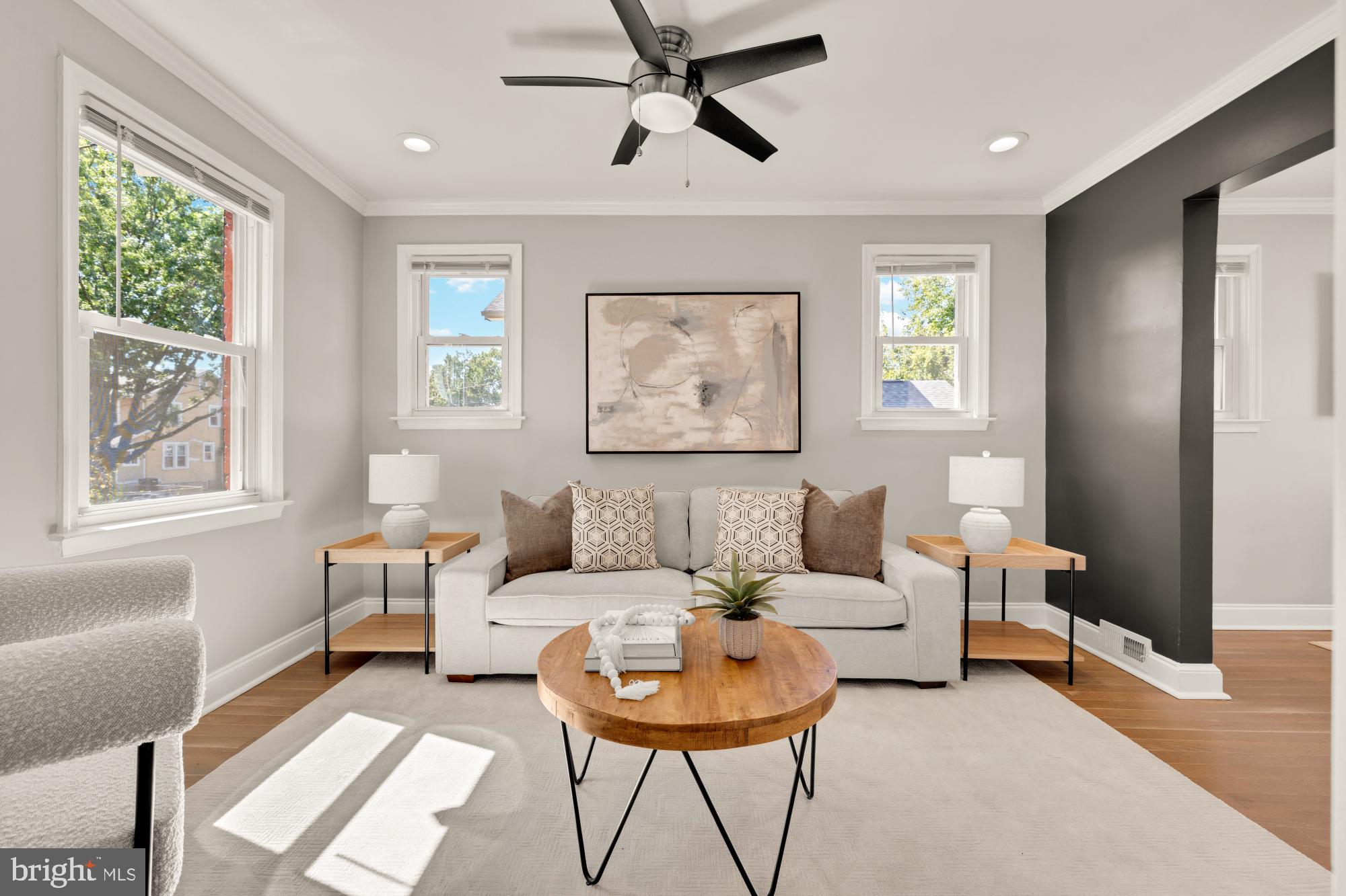 2414 Perry Street Northeast Washington, DC 20018 - Photo 7 of 49 a living room with furniture and a window