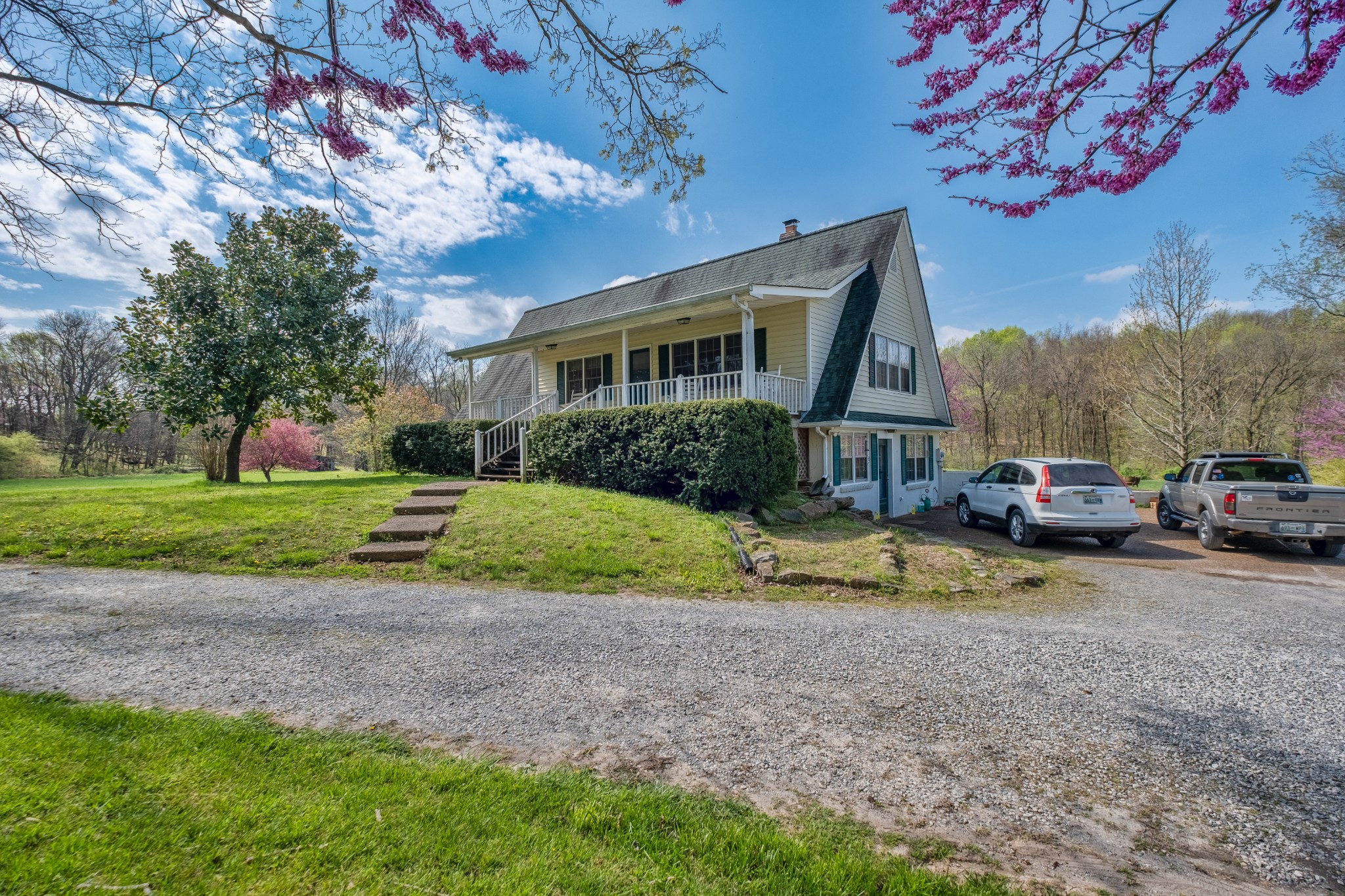 4970 Mt Zion Road Springfield, TN 37172 - Photo 13 of 21 a view of a house with a backyard and a car park