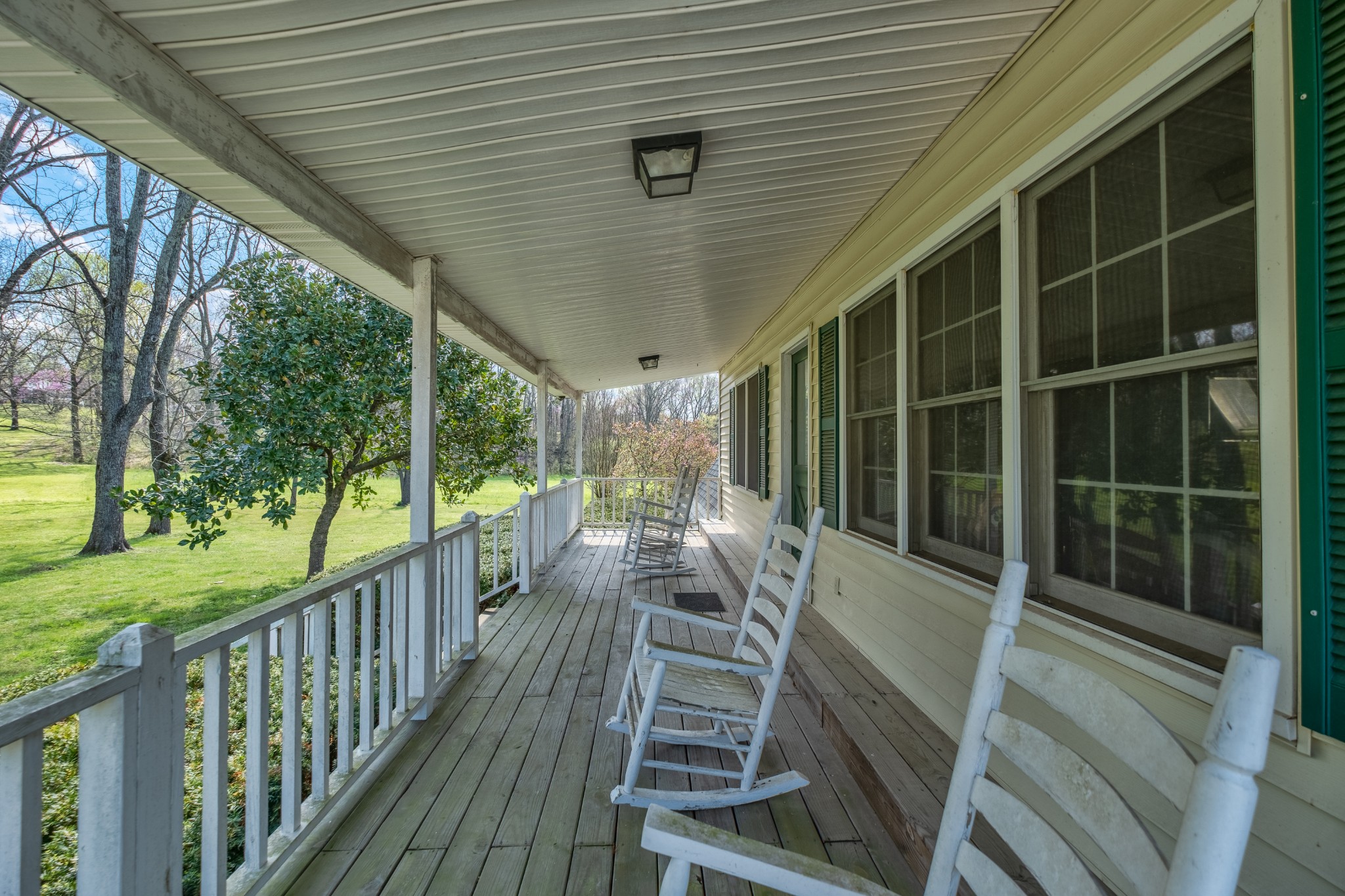 4970 Mt Zion Road Springfield, TN 37172 - Photo 15 of 21 a view of a porch with furniture and wooden deck
