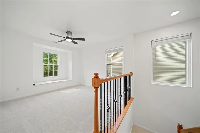 an empty room with windows