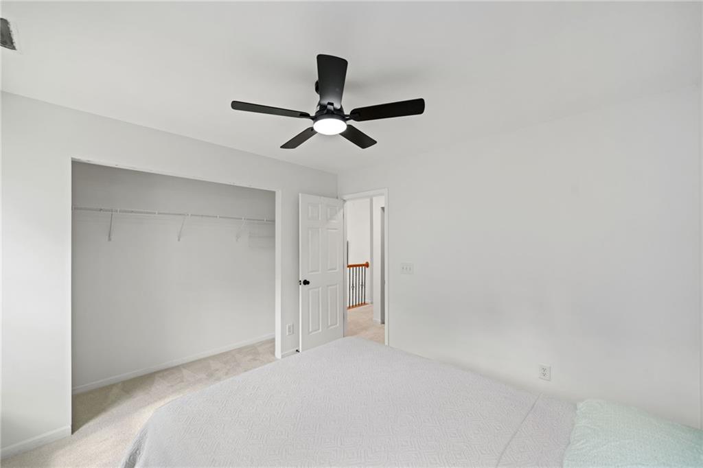 151 Nacoochee Way Canton, GA 30114 - Photo 25 of 36 a view of a livingroom with a ceiling fan and a ceiling fan