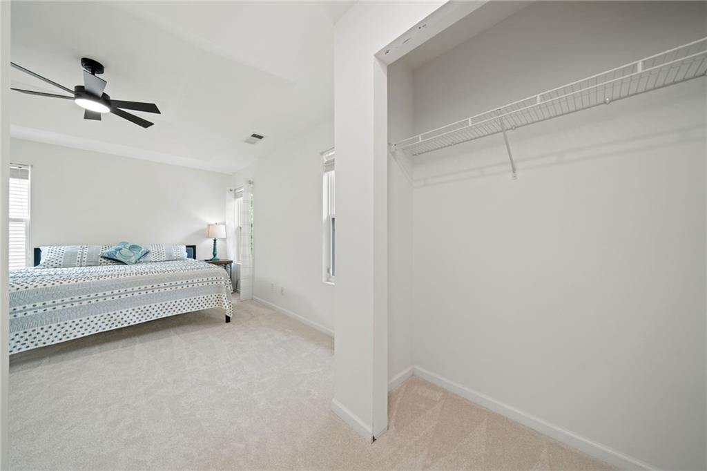 151 Nacoochee Way Canton, GA 30114 - Photo 32 of 36 a bathroom with a bathtub and shower