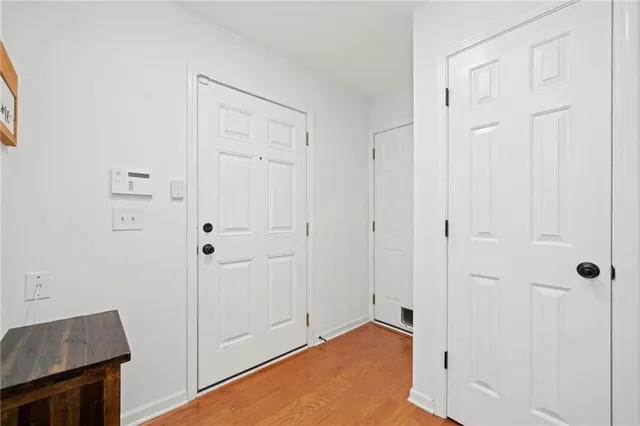 a view of room with hardwood floor