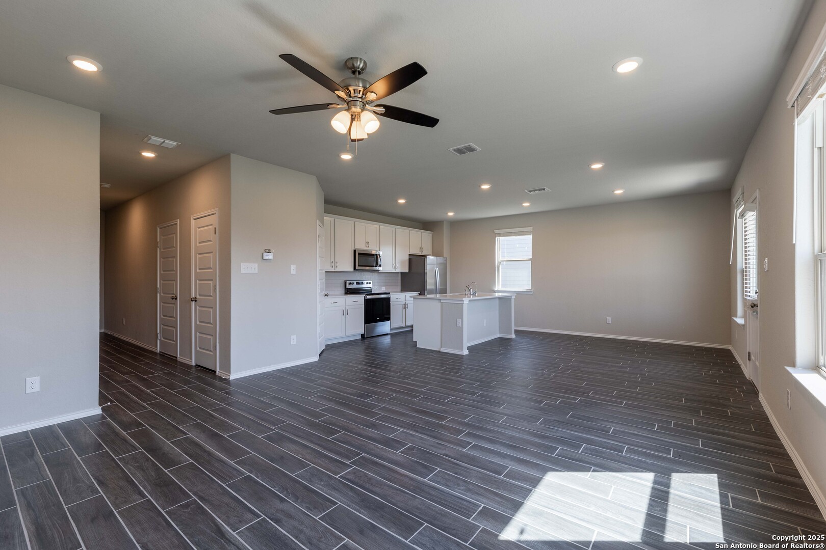 4211 Brigade Bend Converse, TX 78109 - Photo 12 of 30 a view of empty room with wooden floor