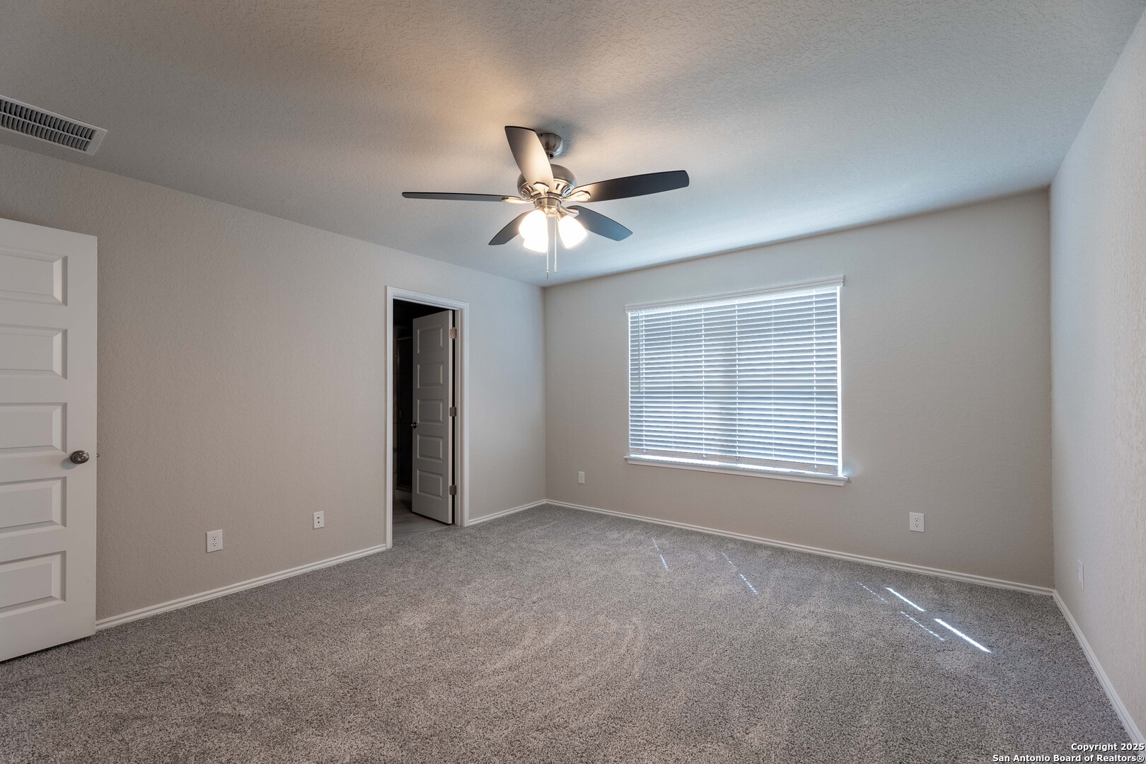 4211 Brigade Bend Converse, TX 78109 - Photo 17 of 30 a view of an empty room with a window