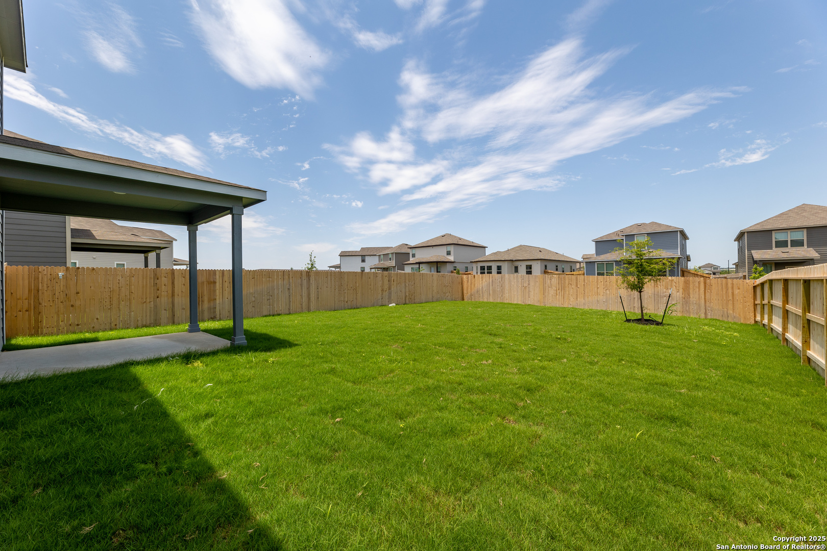 4211 Brigade Bend Converse, TX 78109 - Photo 29 of 30 a view of a big yard next to a building
