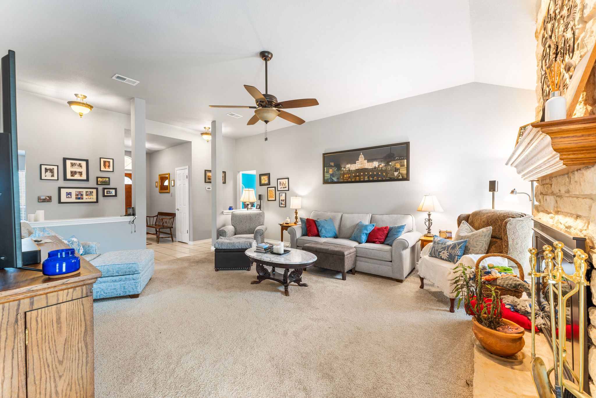 221 Breakaway Road Cedar Park, TX 78613 - Photo 23 of 39 Carpeted living room with ceiling fan