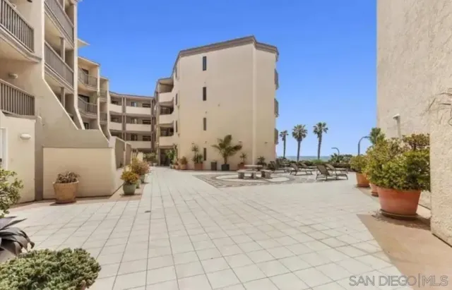 a view of a terrace with chairs
