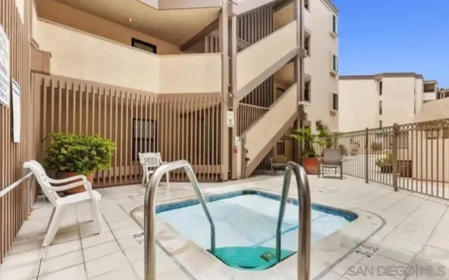 a view of balcony with furniture