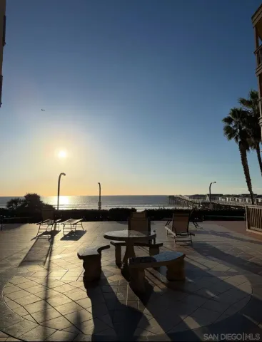 a view of swimming pool with outdoor seating