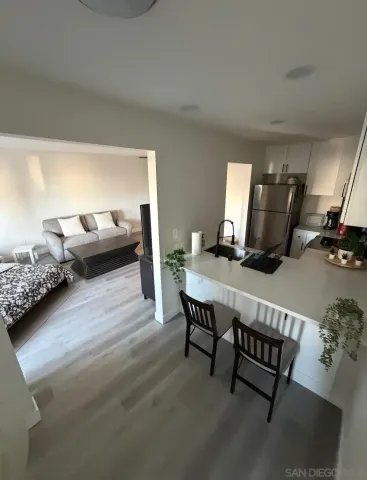 a living room with furniture and a couch