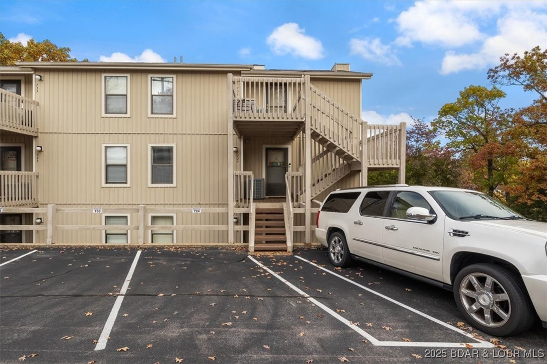 724 Indian Pointe, Unit 724 Osage Beach, MO 65065 - Photo 26 of 39 Designated parking spot just 7 steps up to door