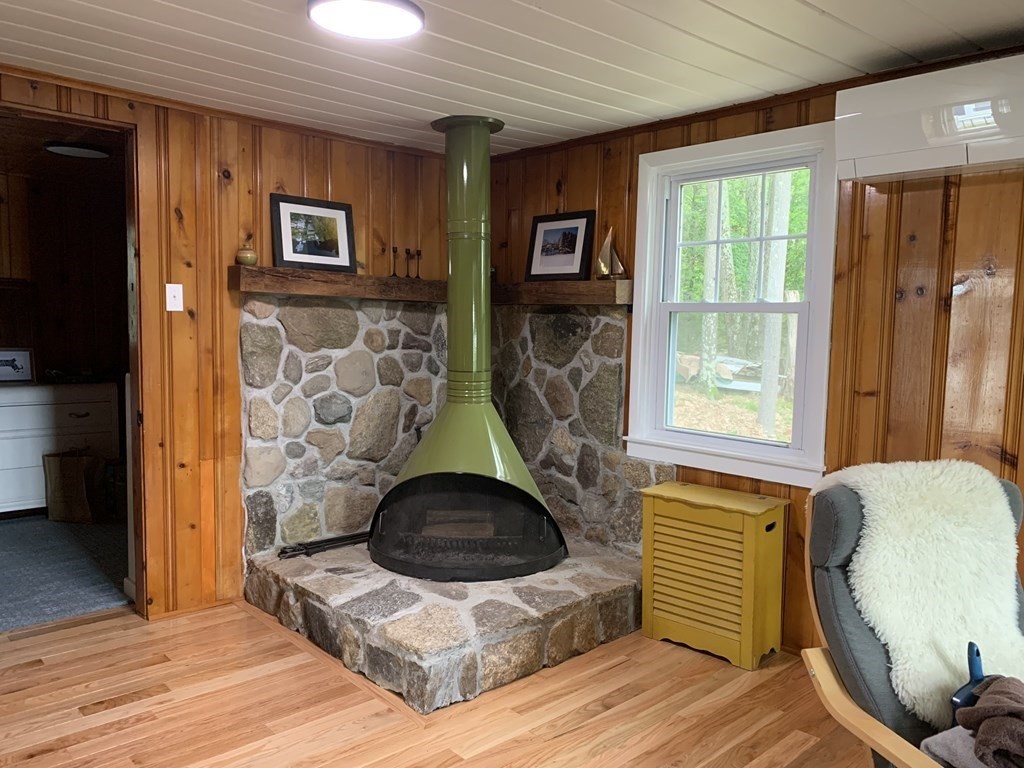 3 Pine Tree Drive Holland, MA 01521 - Photo 7 of 31 a living room with furniture and a fireplace
