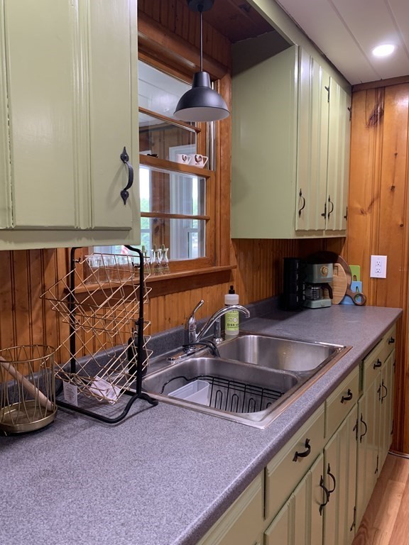 3 Pine Tree Drive Holland, MA 01521 - Photo 9 of 31 a kitchen with a sink and a stove top oven