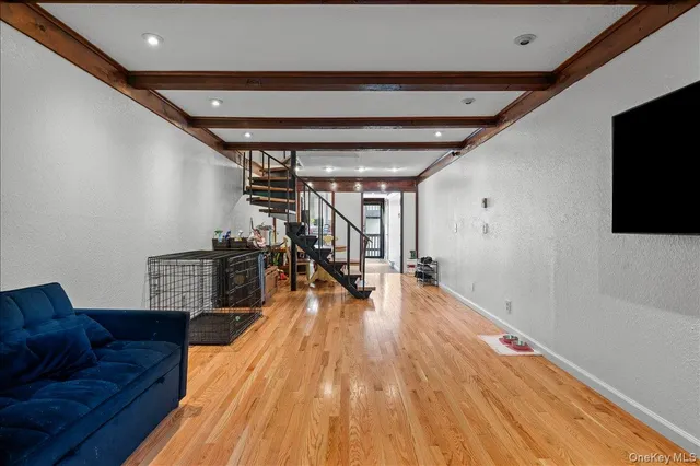 a livingroom with furniture and wooden floor