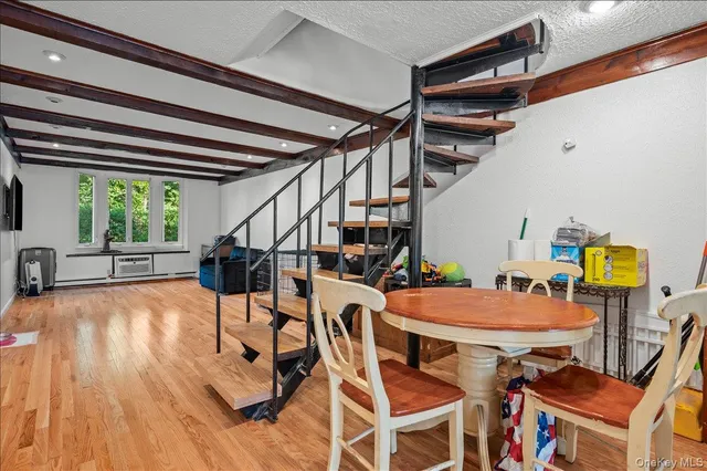 a outdoor space with wooden floor and furniture