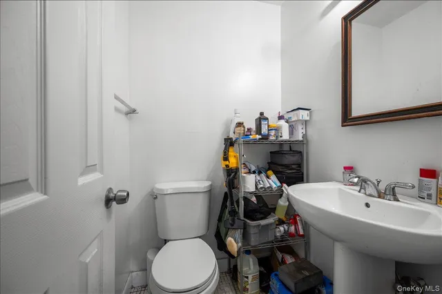 a bed room with furniture and a flat screen tv