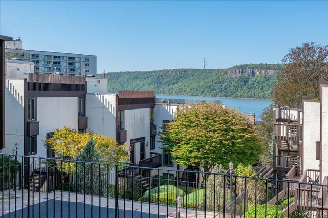 a room with wooden floor and furniture