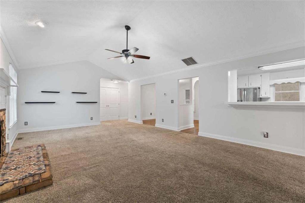 2284 Alcovy Station Road Covington, GA 30014 - Photo 19 of 45 a view of empty room with a kitchen