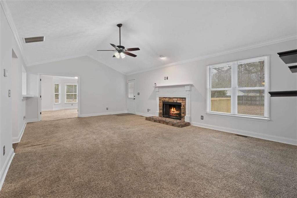 2284 Alcovy Station Road Covington, GA 30014 - Photo 21 of 45 a view of empty room with a fireplace
