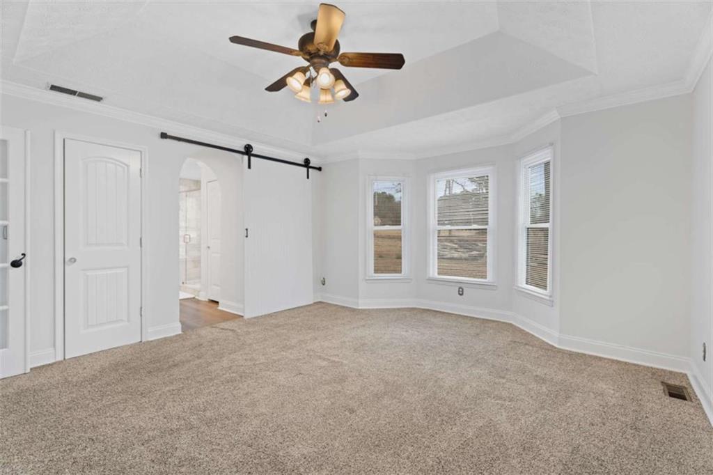 2284 Alcovy Station Road Covington, GA 30014 - Photo 23 of 45 a view of an empty room with a window